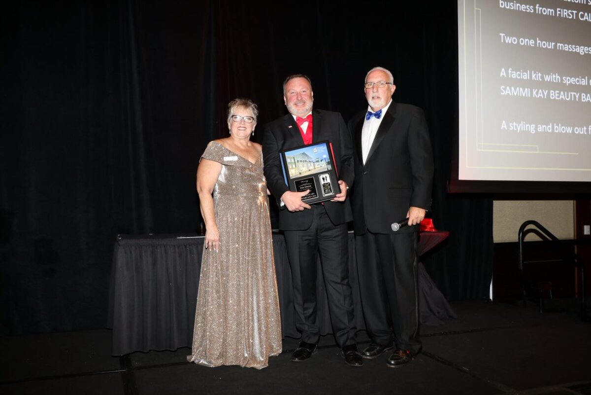 Pete Chryss accepting a community award