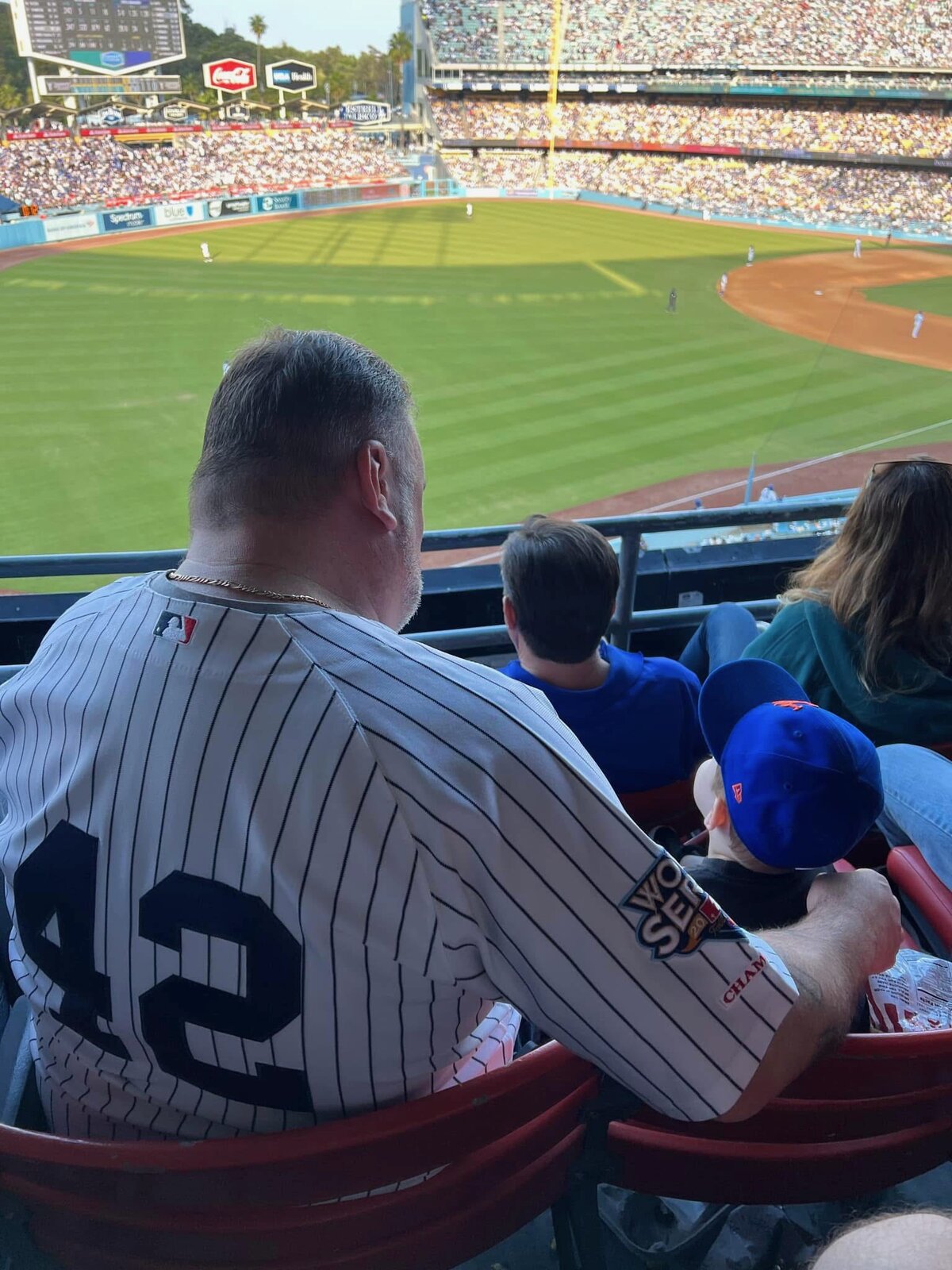 Pete Chryss with family at a baseball game